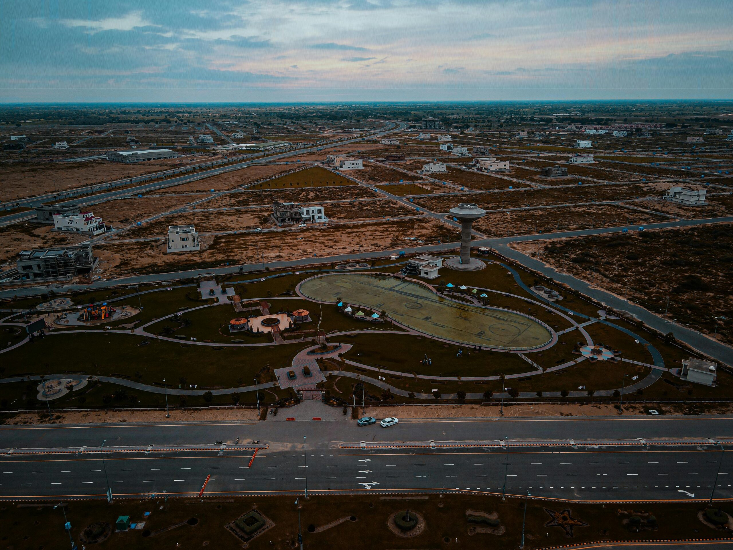 Aerial view of urban development and roads in Bahawalpur, Pakistan, showcasing infrastructure and open spaces.